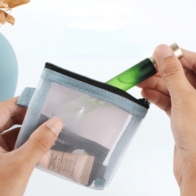 Trousse de toilette transparente en maille pour femme
